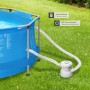 Blauer Tectake Swimming Pool mit Stahlrahmen und Filterpumpe im Garten.
