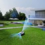 Ecovacs Mähroboter Goat A3000 Lidar Pro in Aktion auf Rasen vor modernem Haus.