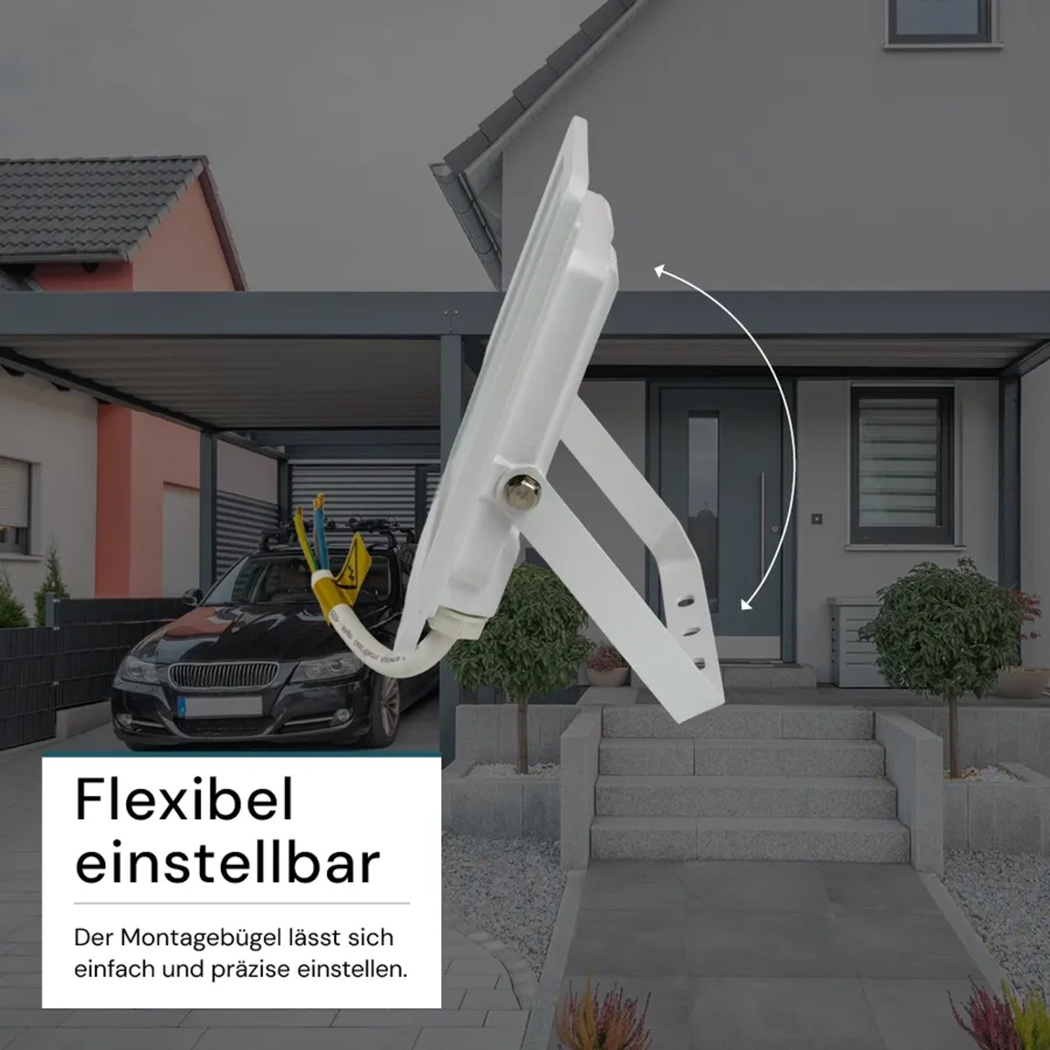Flexibel einstellbarer, weißer LUXULA LED Strahler (30W) mit Haltebügel für Außenmontage.