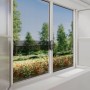 tesa® Insect Stop Fliegengitter Fenster Open/Close, anthrazit, mit Blick nach draußen.