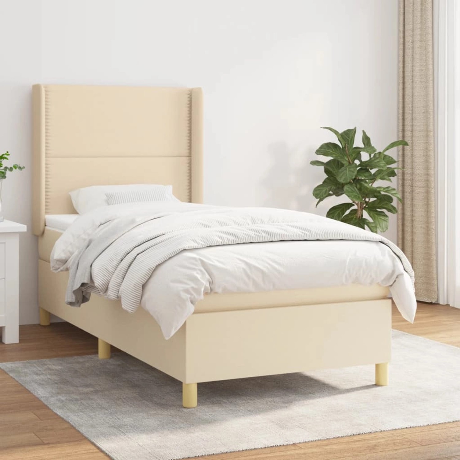 Cremefarbenes vidaXL Boxspringbett (90x190 cm) mit Matratze und hohem Kopfteil.