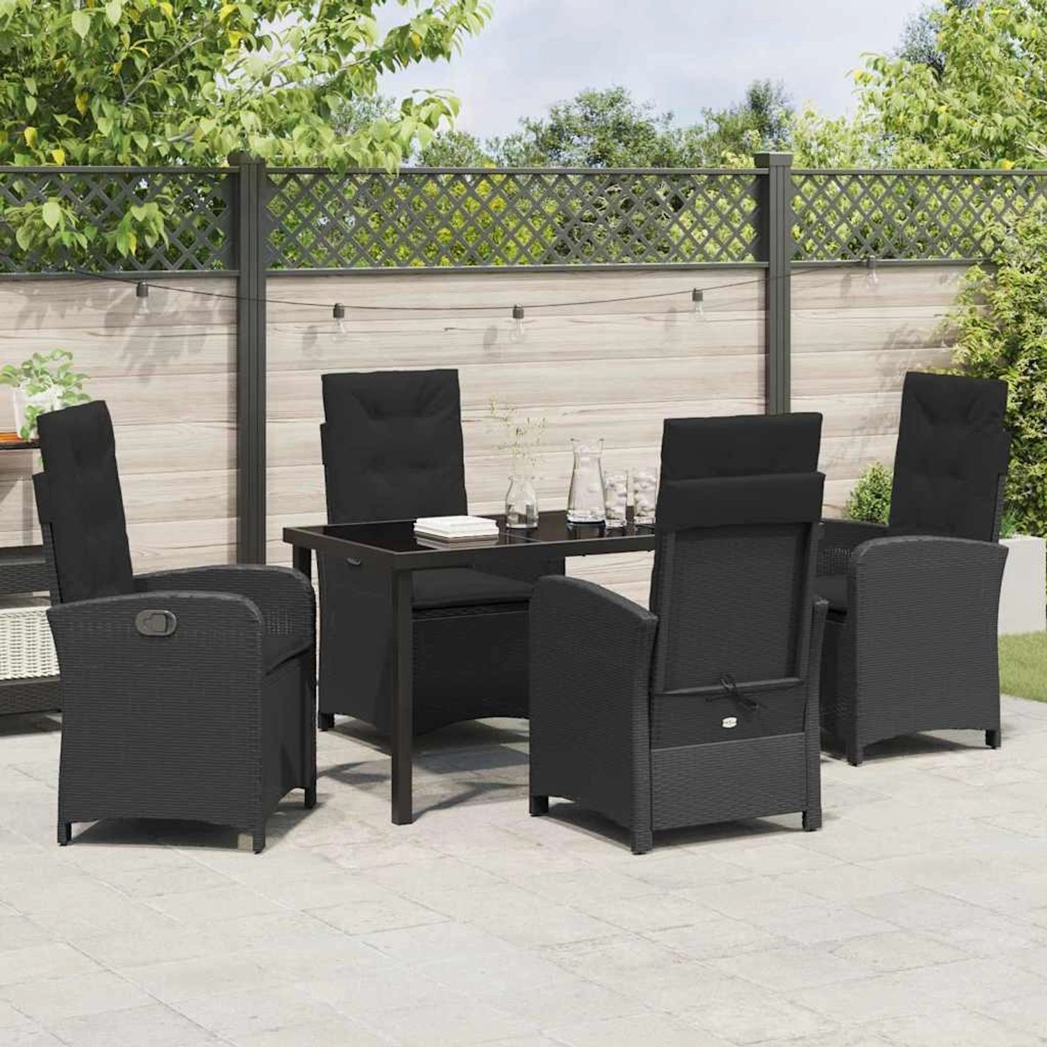 Schwarze 5-tlg. Garten Essgruppe aus Poly Rattan mit Tisch und Stühlen für 4 Personen.
