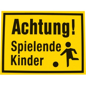 Gelbes Hinweisschild "Achtung spielende Kinder" mit Kind und Ball.
