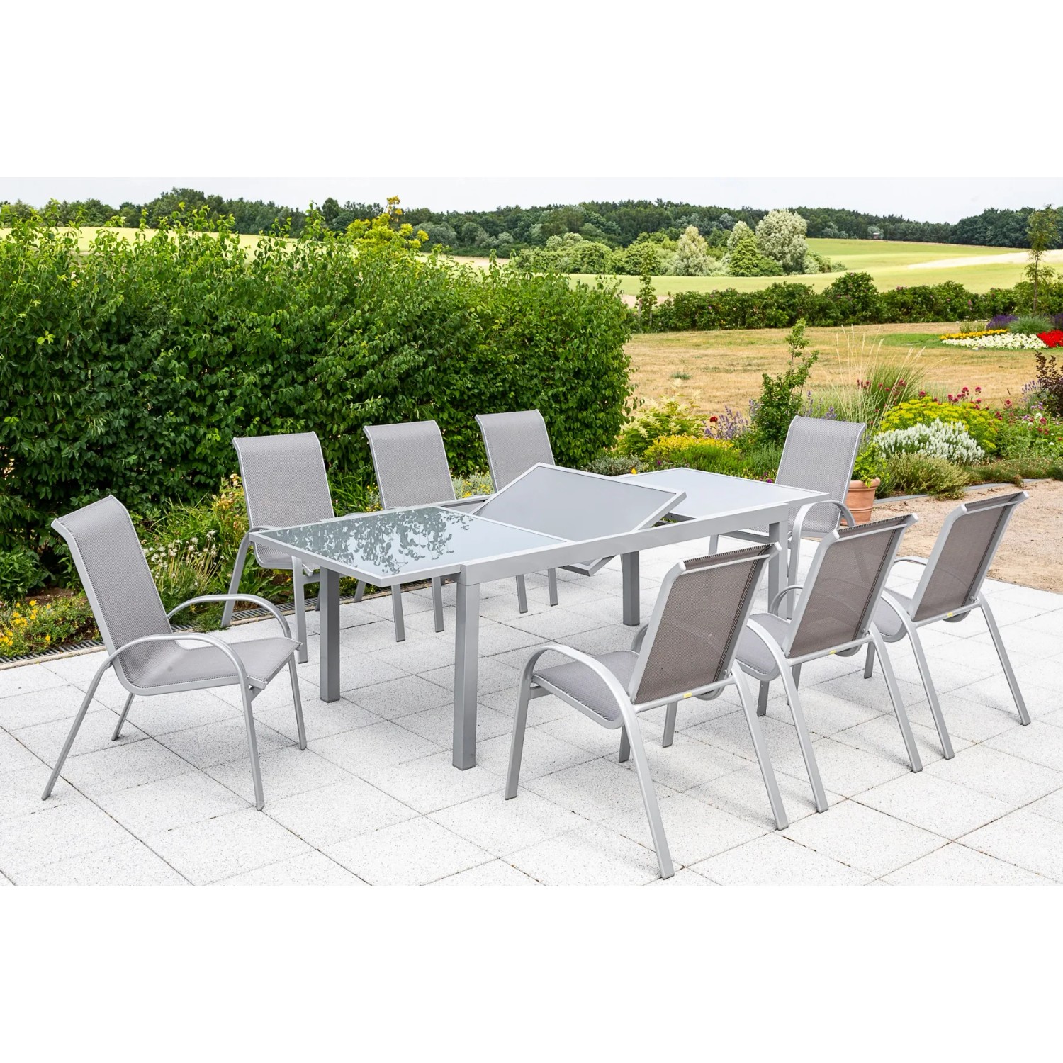 9-teiliges Gartenmöbel-Set Merxx Amalfi mit Ausziehtisch und 8 Stapelsesseln in Diamantbraun.