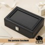 Schwarze BigDean Uhrenbox für 12 Uhren mit Glasdeckel und weißen Ziernähten.