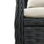 Detailaufnahme: Schwarze Poly Rattan Gartenmöbel Essgruppe mit cremefarbenen Kissen.