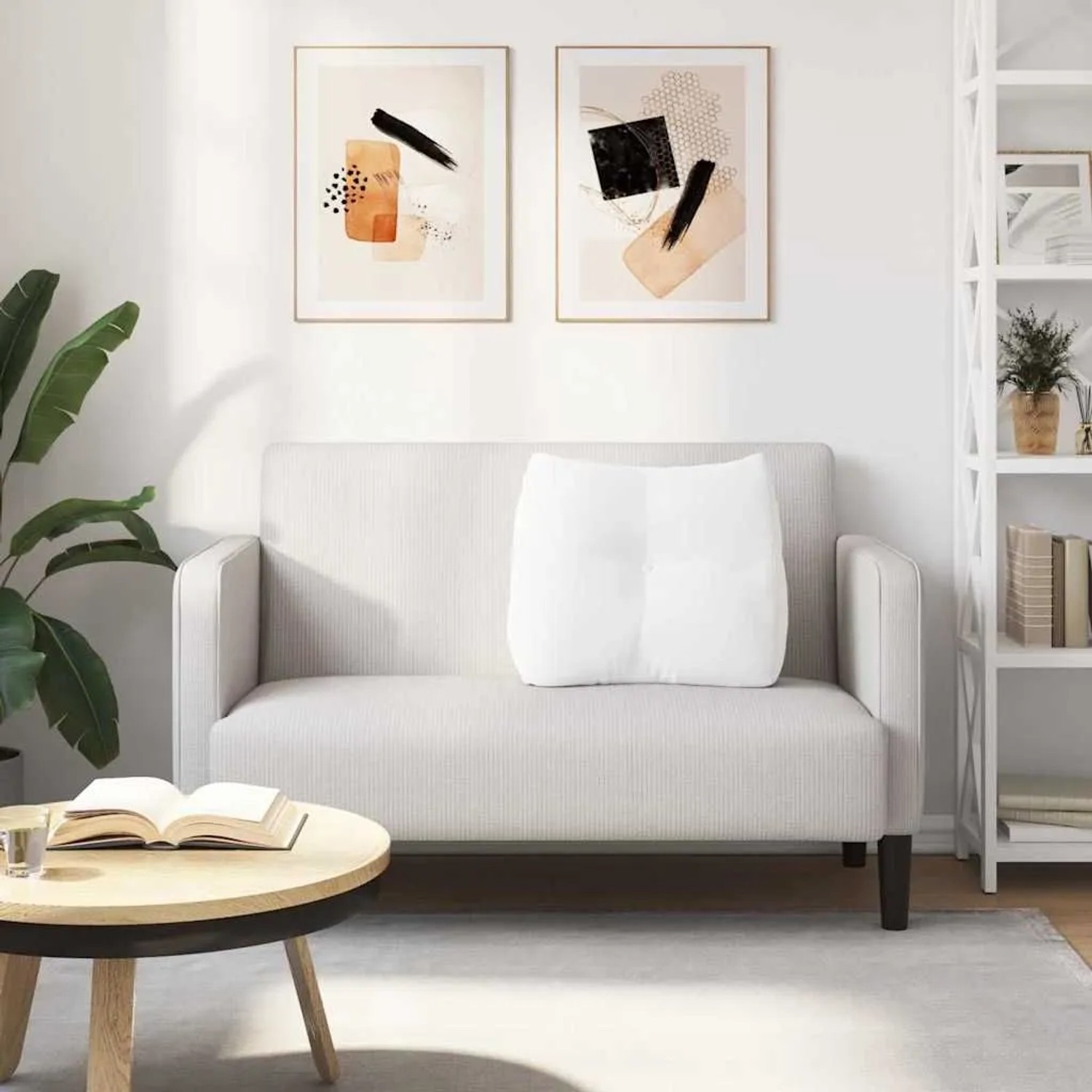 Weißes vidaXL Rückenkissen aus Stoff mit Knopf auf hellem Sofa. Ergonomisches Kissen für Wohnzimmer.
