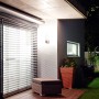 Moderne Steinel LED-Außenleuchte L 260 S aus Edelstahl mit Bewegungsmelder an Hauswand.