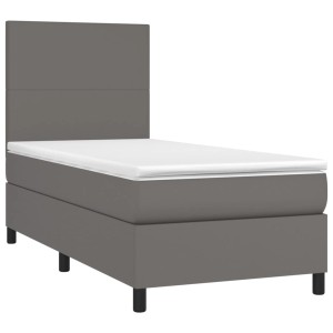 Graues vidaXL Boxspringbett mit Matratze, LED und Kunstleder, 90x200 cm.
