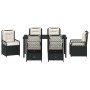 Schwarze 7-teilige vidaXL Garten Essgruppe aus Poly Rattan mit Tisch und Stühlen mit Auflagen.