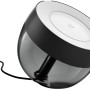 Schwarze Philips Hue Iris Tischleuchte mit Farbwechsel und 570 lm Lichtstärke.