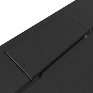 Detailaufnahme: Anthrazitfarbene Breuer Duschwanne LiteLine Quadrat mit Steinstruktur.