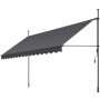 Schwarz-graue Klemmmarkise mit Handkurbel, ausgefahren. Wellenförmiger Volant, Teleskopstangen. Ideal als Sonnenschutz.
