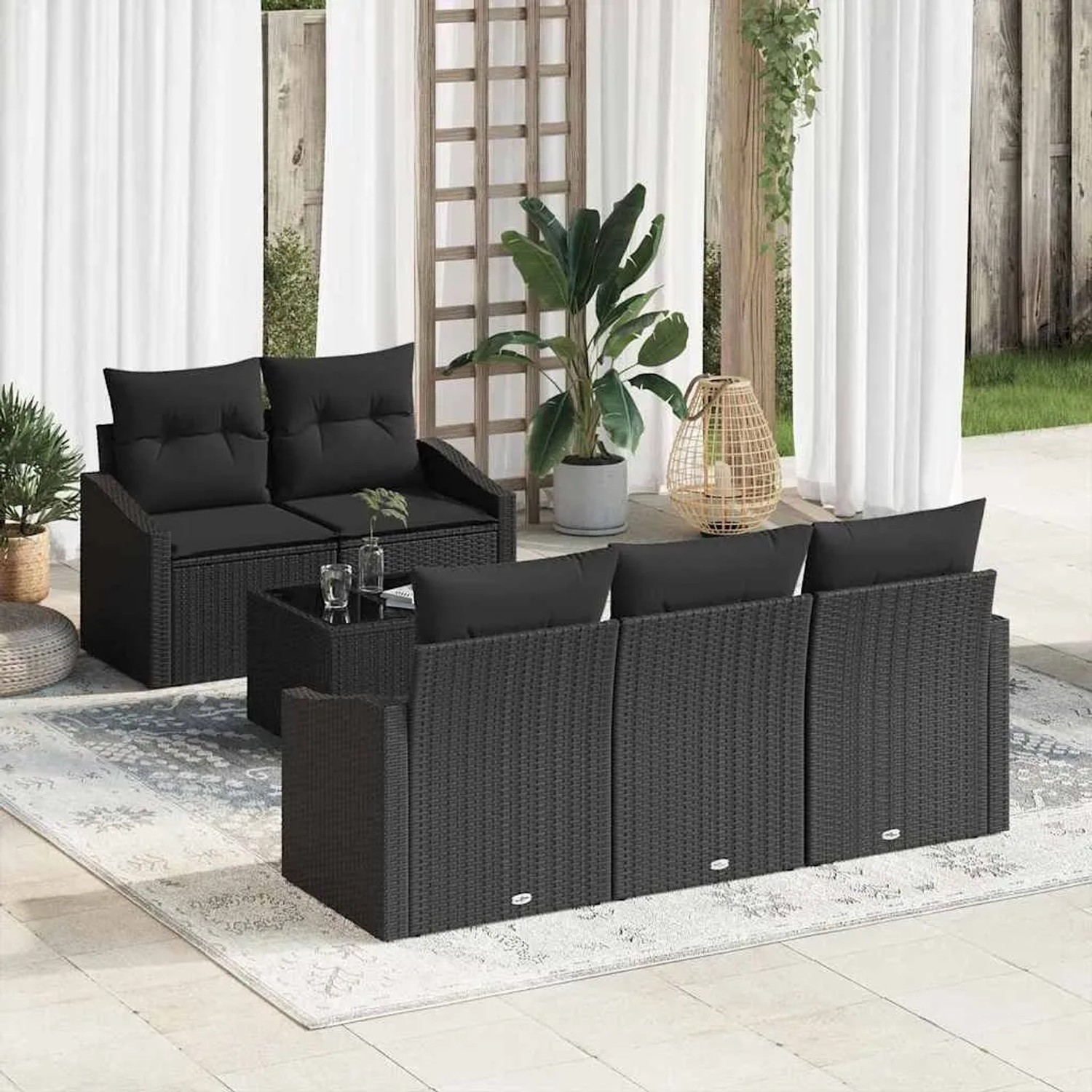 Schwarzes 6-tlg. vidaXL Sofa Set aus Poly-Rattan mit Kissen und Stauraum für den Garten.