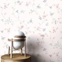 Newroom Vliestapete Florin Pastella mit Blumenmuster in Pastellfarben.