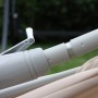 Detailaufnahme: Kurbelmechanismus des MCW Sonnenschirms Castellammare, bordeauxfarben.