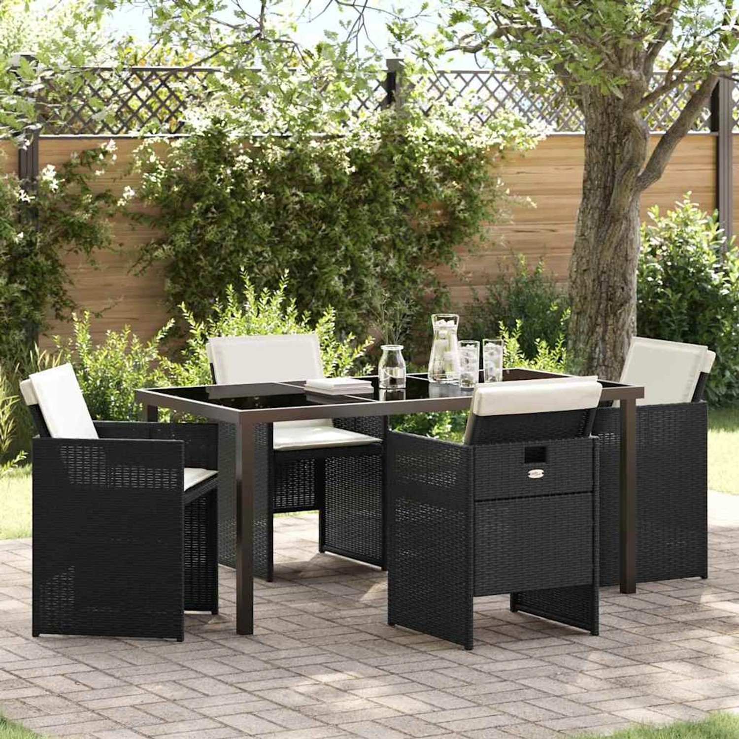 Schwarze 5-tlg. vidaXL Garten Essgruppe aus Poly Rattan mit Tisch und 4 Stühlen.