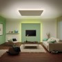 Wohnzimmer mit Paulmann LED-Strip MaxLED als indirekte Beleuchtung an Decke und Wand.