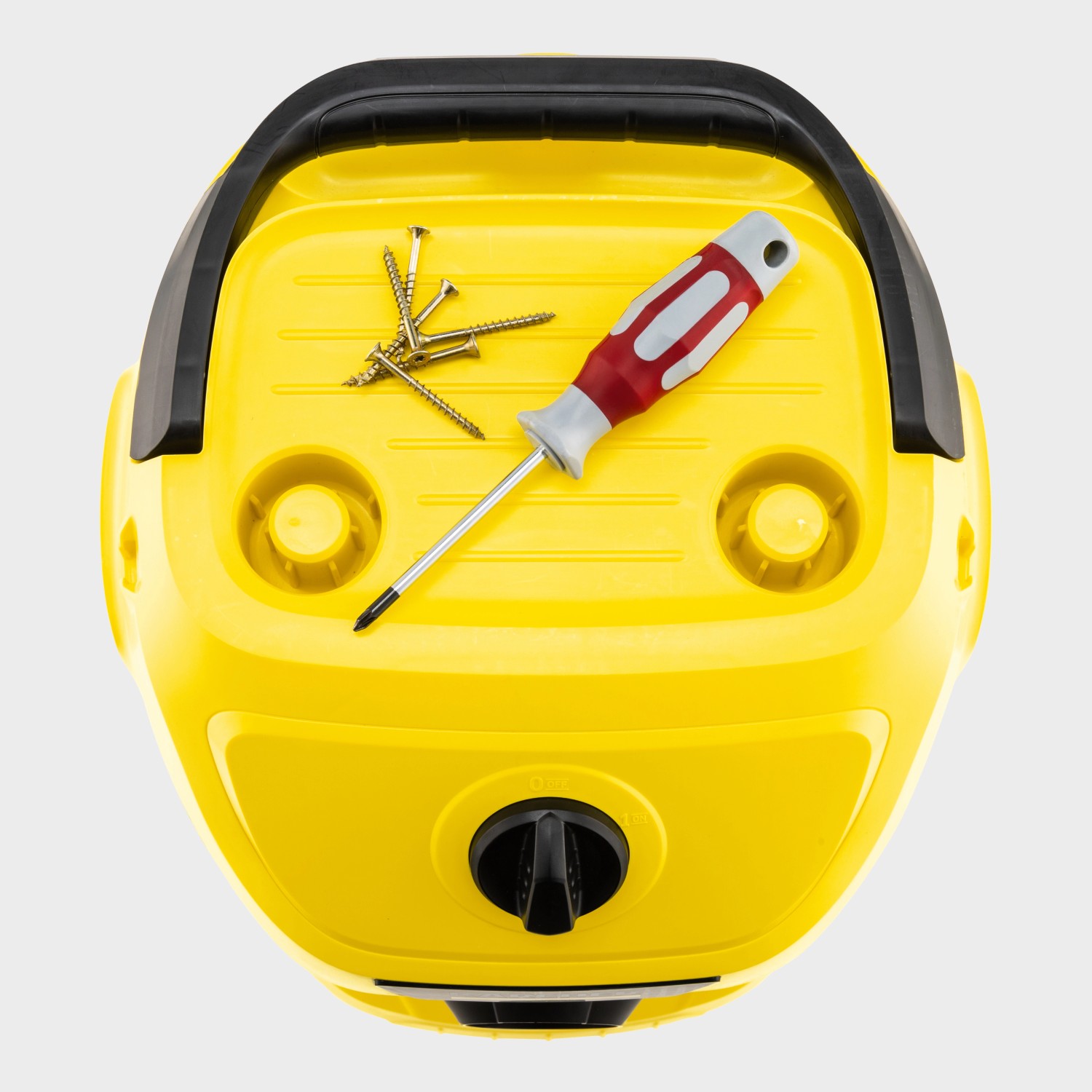 Gelber Kärcher Nass-/Trockensauger WD 3 V-17/4/20 mit Schrauben und Schraubendreher von oben.