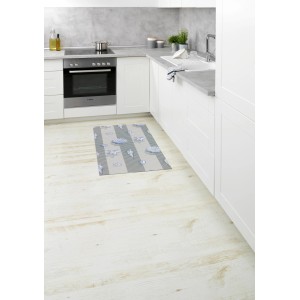 Mehrfarbige Wenko Badematte Mare 50x80 cm mit maritimem Muschel-Design im Badezimmer.