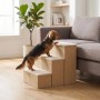 Beige Hundetreppe mit 3 Stufen, ein Dackel steigt auf das Sofa. Praktische Aufstiegshilfe für Haustiere.
