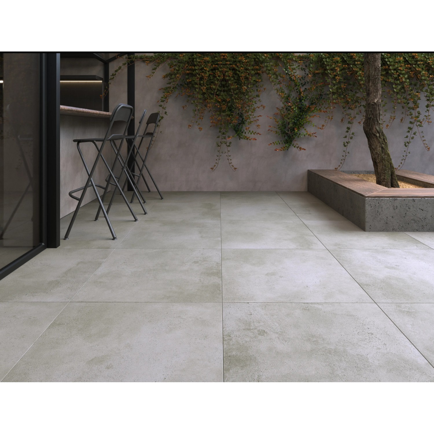 Terrassenplatten Feinsteinzeug Vero 2.0 in Zementoptik Grau, 80x80 cm, verlegt auf einer Terrasse.