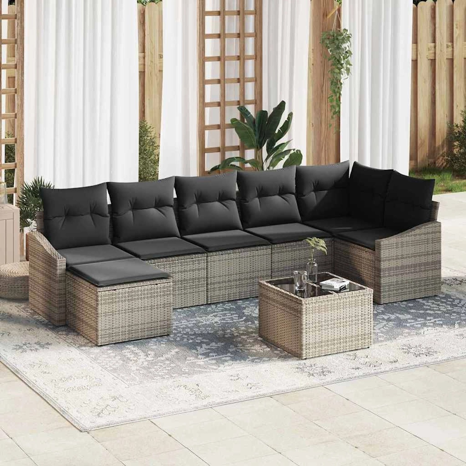 Graues 8-teiliges vidaXL Garten-Sofa-Set aus Poly Rattan mit Tisch und schwarzen Kissen.