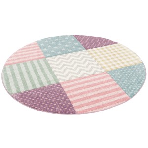 Runder, bunter Kinderteppich mit Sternen, Streifen, Punkten und Zickzackmuster.