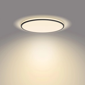 Schwarze, runde Philips LED-Deckenleuchte Ozziet SceneSwitch mit warmweissem Licht.