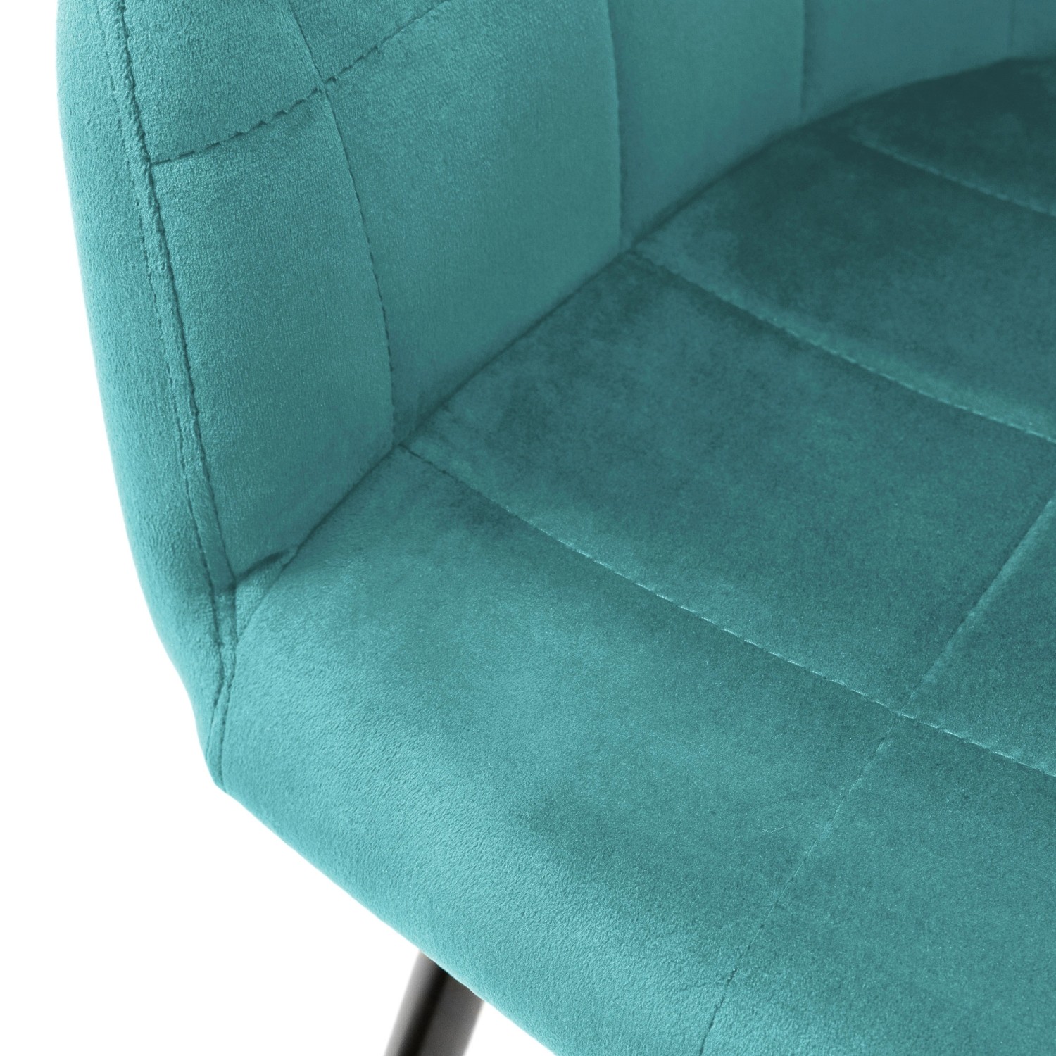 Detailaufnahme: Türkiser Esszimmerstuhl mit Samtbezug und Rautensteppung.