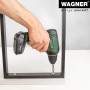 Schwarzer Wagner Designrahmen (710x300mm) wird mit Akkuschrauber montiert.