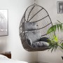 Grauer Beliani Hängesessel (70x84x113) mit Kissen im Boho-Stil.
