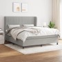 Helles Boxspringbett 180x200 cm mit Stoffbezug und Matratze für Schlafzimmer.