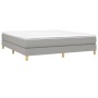 Helles Boxspringbett mit Matratze, hellgrauer Stoff, 160x200 cm. Bequemes Bett für erholsamen Schlaf.
