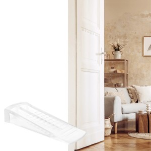 Transparenter Türkeil von Wagner, 80x30x15 mm, unter einer Tür. Türstopper für sicheren Halt.