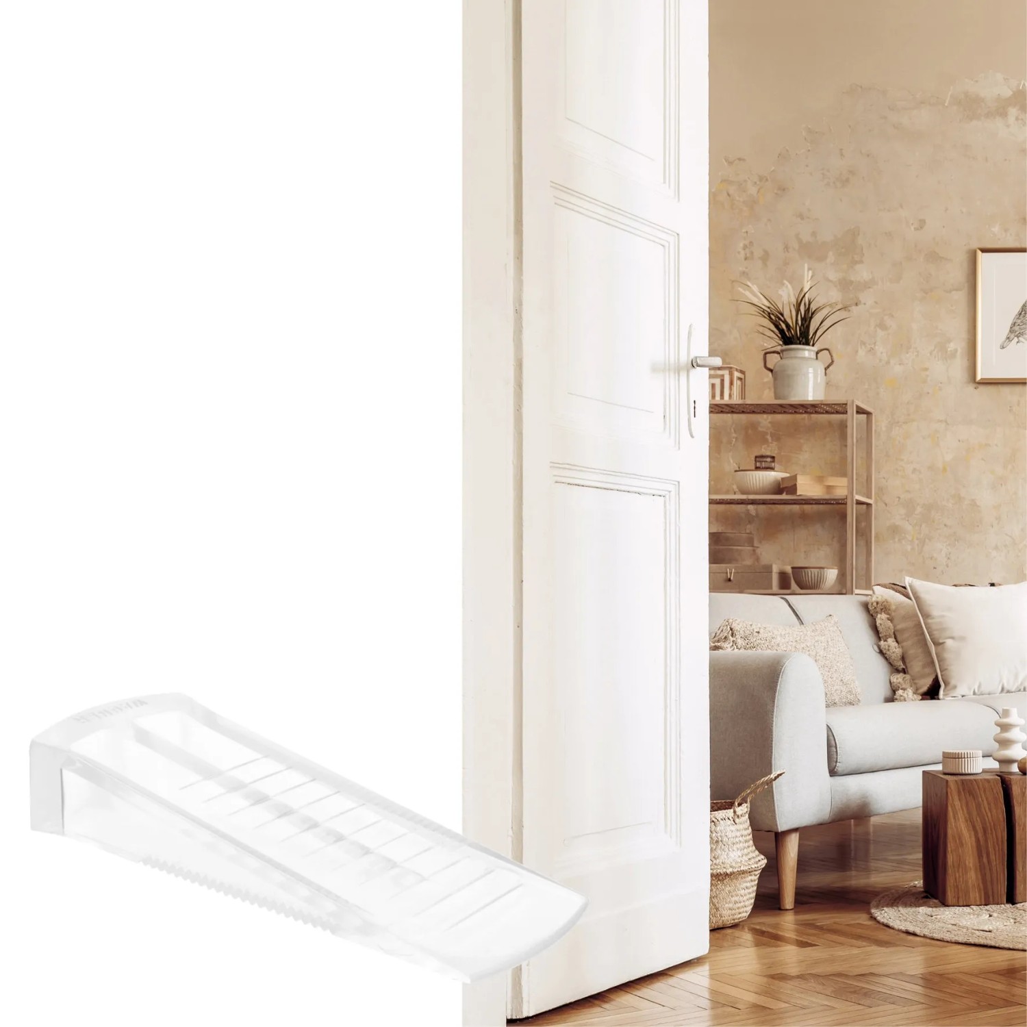 Transparenter Türkeil von Wagner, 80x30x15 mm, unter einer Tür. Türstopper für sicheren Halt.