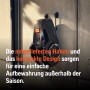 Husqvarna Aspire R4 Mähroboter, platzsparend an der Wandhalterung verstaut.