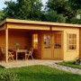 Carlsson Gartenhaus Carl-28 mit Pultdach, imprägniert, 578x274 cm. Holzhaus mit Terrasse und Gartenmöbeln.
