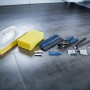 LUX Fliesenlegerset, 9-teilig, mit Schwammbrett, Fliesenzange, Schaber und weiterem Zubehör.