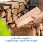 Kaminholzregal EcoStar Trend-V Typ 1 purpurrot mit Holz gefüllt.