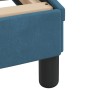 Detailansicht: Blaues Samt Bett mit Matratze und schwarzen Füßen.