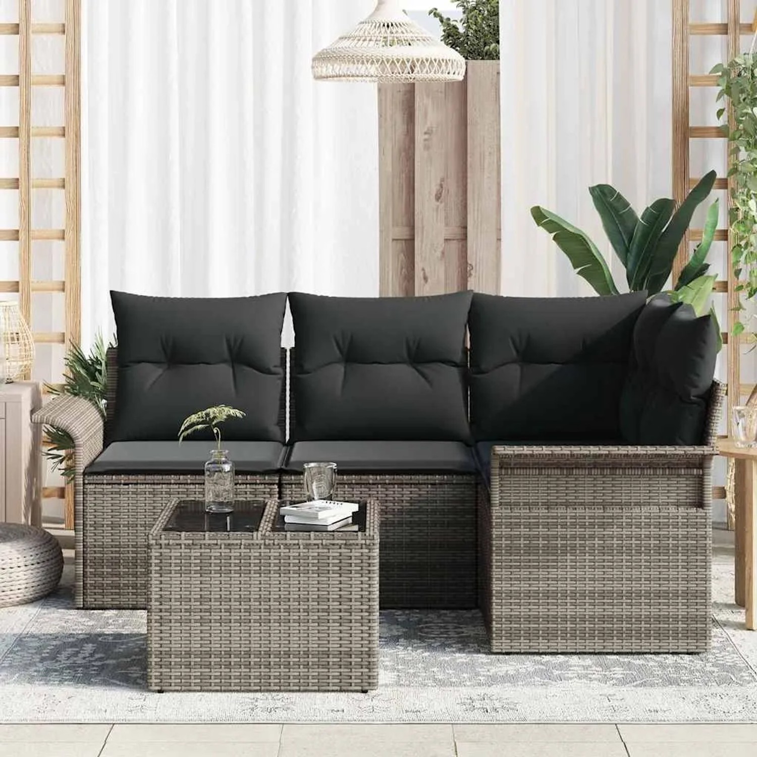 Graues 5-teiliges vidaXL Garten-Sofa-Set aus Poly Rattan mit Kissen und Stauraum.