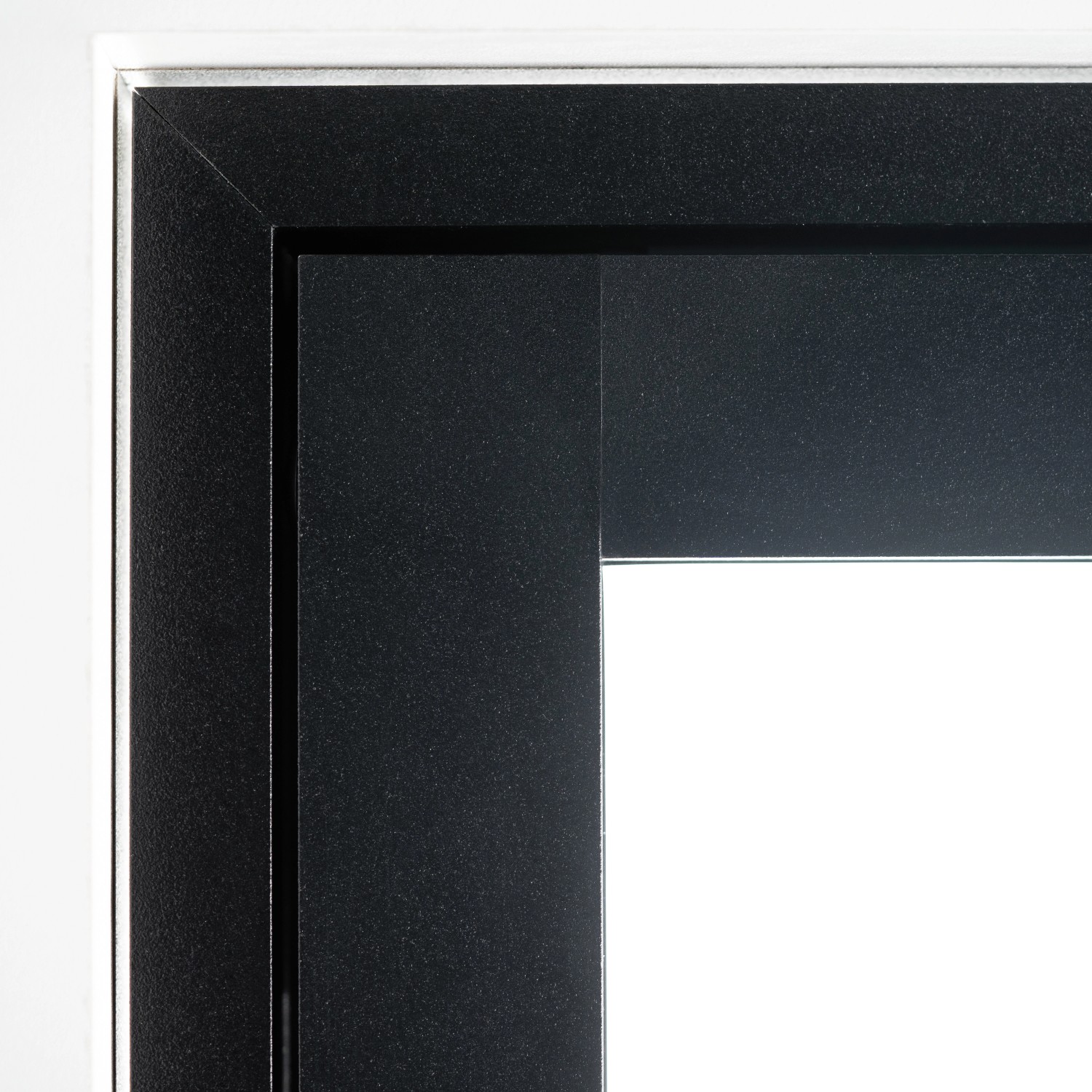 Detailaufnahme: Loft+Mehr Drehtür-Set mit Blockzarge, DIN Rechts, schwarzer Rahmen.