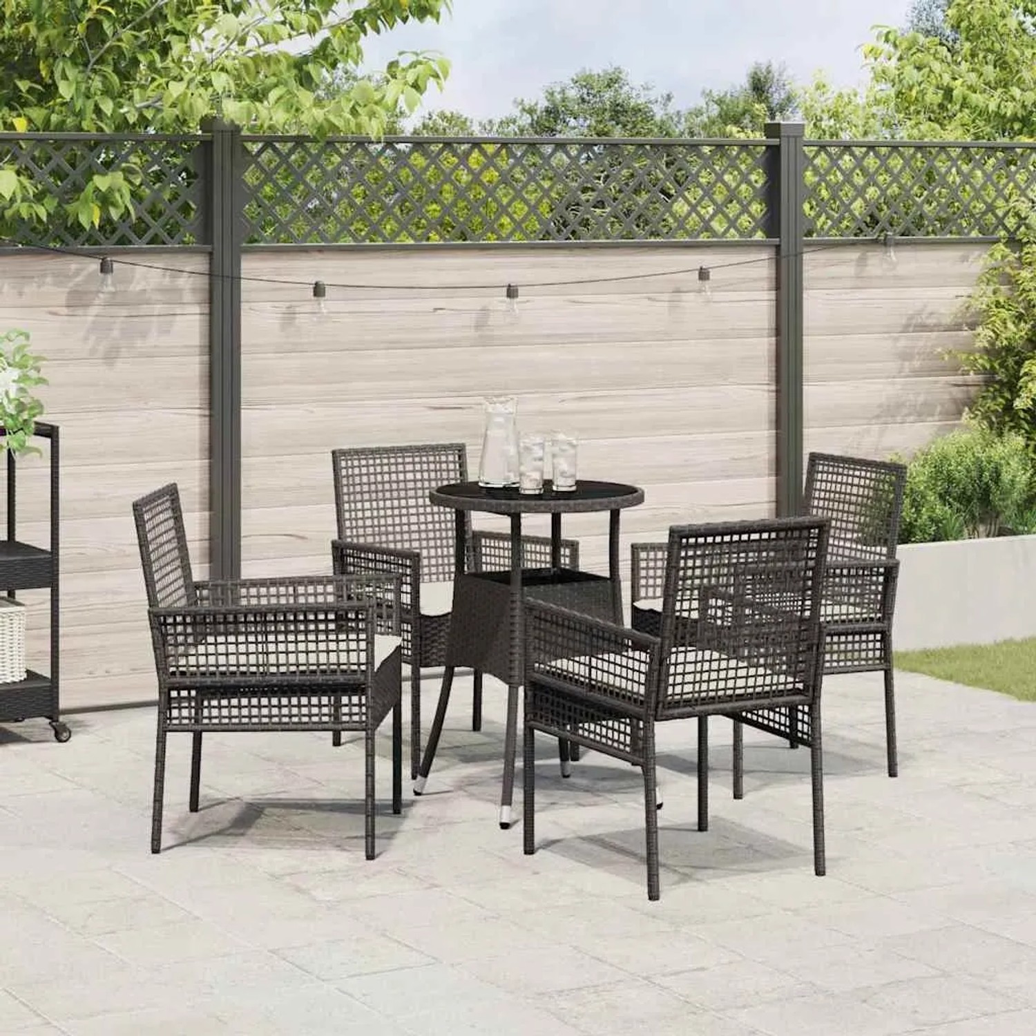 Schwarze 5-tlg. Garten Essgruppe aus Poly Rattan mit Tisch und 4 Stühlen.