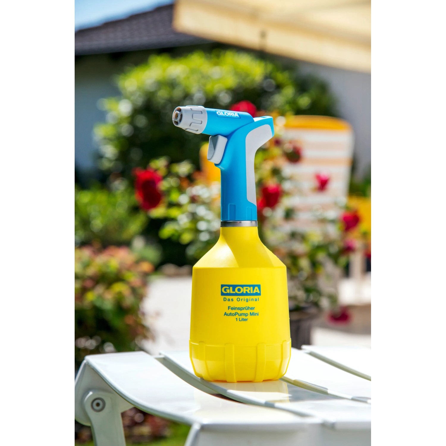 Gloria AutoPump Mini Feinsprüher, 1 l, gelber Behälter mit blauem Sprühkopf.