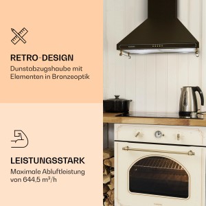 Schwarze Klarstein Victoria Dunstabzugshaube (60cm) im Retro-Design mit bronze-farbenen Akzenten.