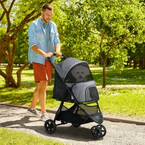 Grauer PawHut Hundewagen Oxford Stahl mit Mann und Hund im Park.