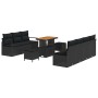 Schwarzes 10-teiliges vidaXL Garten-Sofa-Set aus Poly Rattan mit Tisch und Kissen.