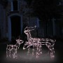 Drei leuchtende LED-Rentiere in Warmweiß als Weihnachtsdekoration für den Außenbereich vor einem Haus.