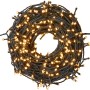 LED Lichterkette mit 1000 warmweißen LEDs und grünem Kabel, aufgerollt dargestellt.